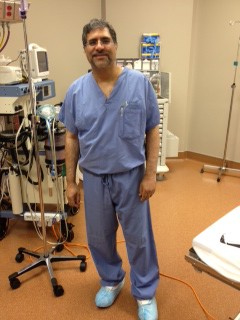 Full Image of Dr. Shah Siddiqi Spinal Surgeon / Neurosurgeon in Surgery at Texas Spine Center in Houston, TX